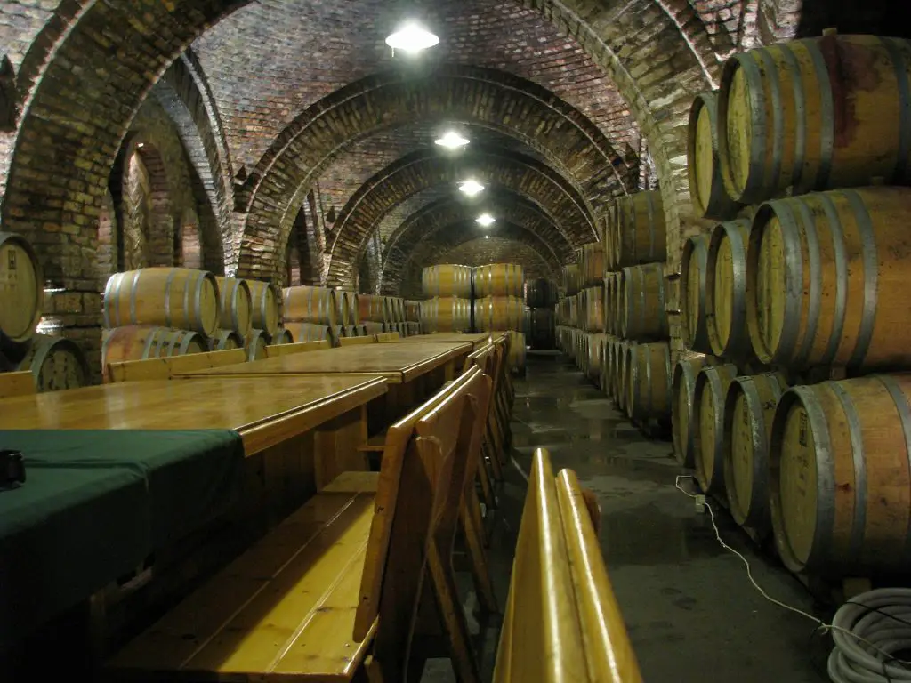 Tables and benches in a wine cellar vault